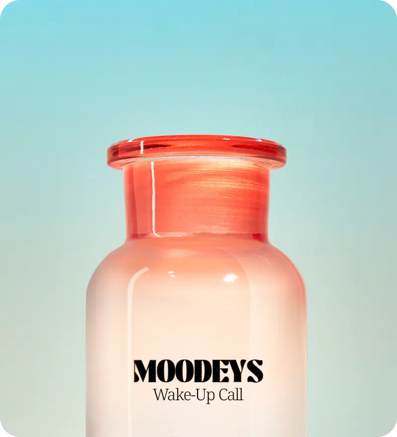 Image of CGI Moodeys Wake-Up Call bottle without cap against a blue background