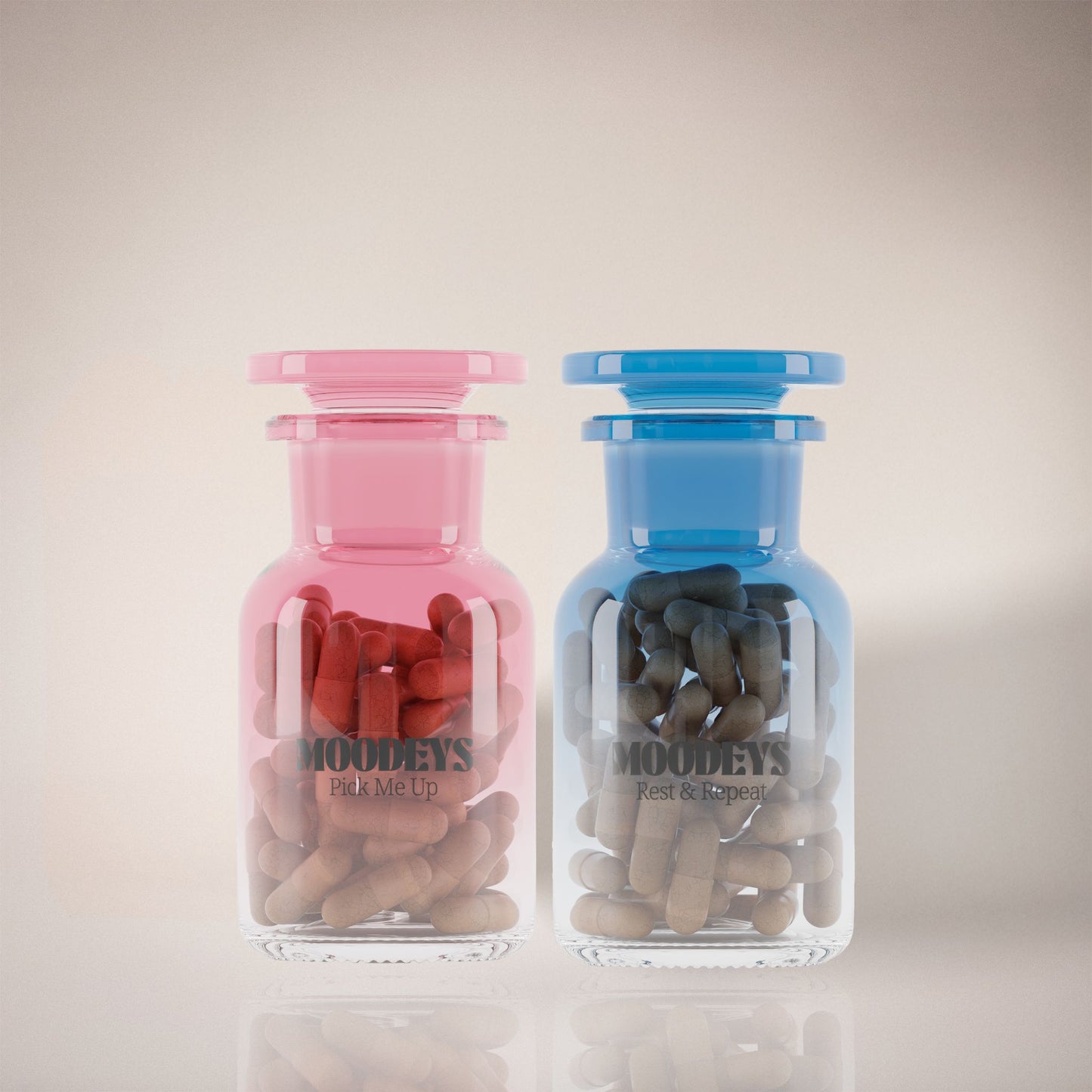 Two glass jars, one pink and one blue, filled with rest and repeat and pick me up on a light background.