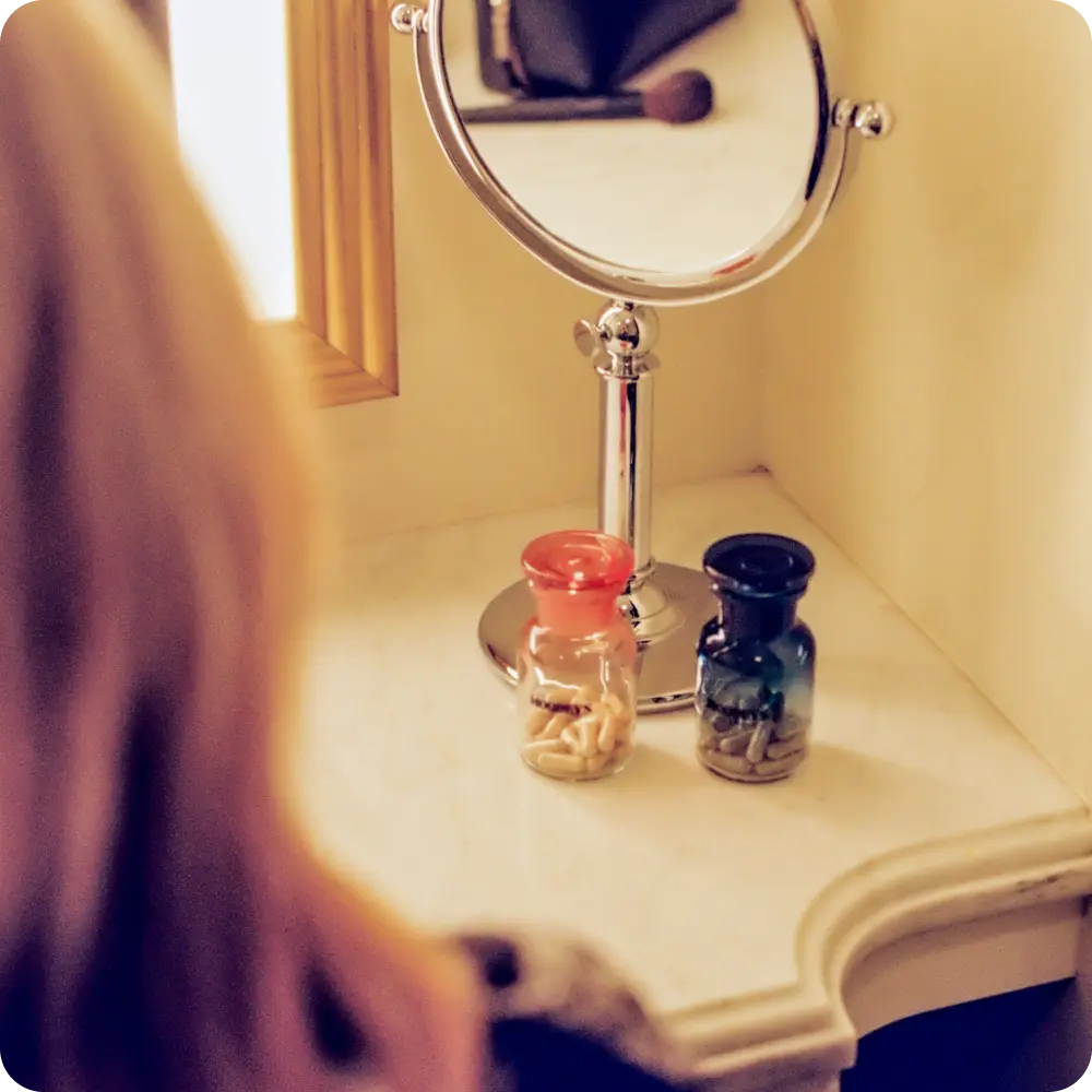 Two Moodeys' bottles on dressing table